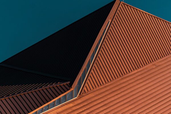 brown concrete building under blue sky during daytime
