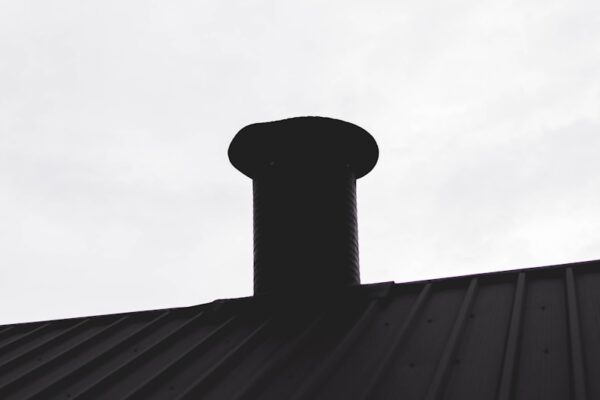 a black and white photo of a metal roof